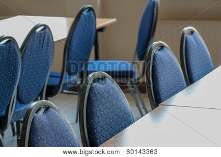 Blue chairs in a meeting room