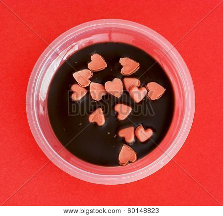 Tasty Pudding With Little Hearts Of Marzipan