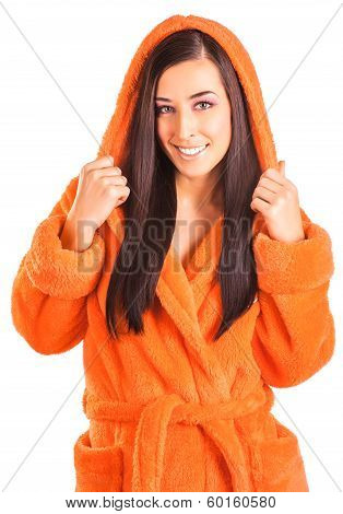 cute brunette in an orange bathrobe