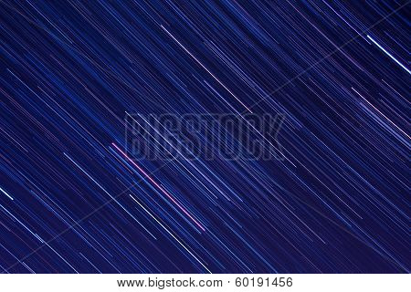 Abstract background with, Orion star trails in the night sky