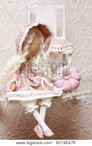 Textile doll is made by hand for children