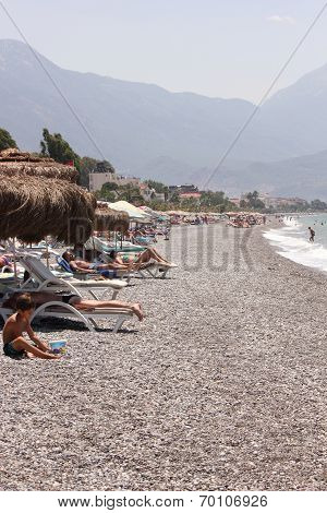 Sunbathing on calis beach
