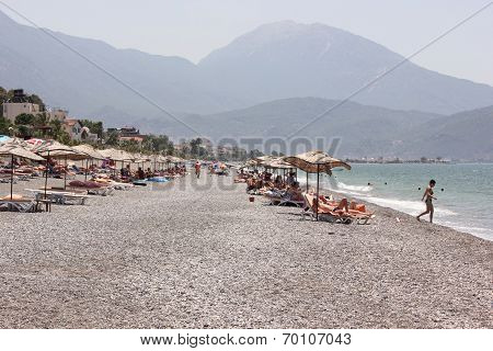 Sunbathing on calis beach