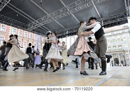 ZAGREB, CROATIA - JULY 19: Members of folk groups Nograd  from Salgotarjan, Hungary during the 48th International Folklore Festival in center of Zagreb, Croatia on July 19, 2014