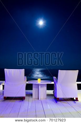 Chairs In Front Of The Beach