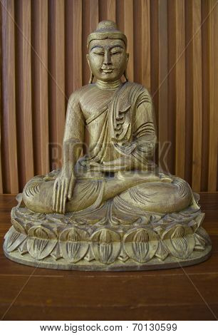 Wooden Budha On Table