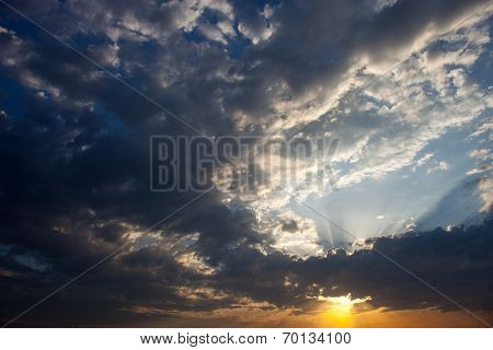 Cloudscape With The Sun Rays Radiating From Behind The Cloud
