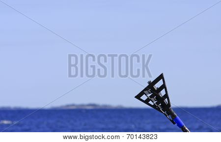 Wooden sea-mark, navigation mark along the coast.