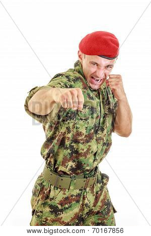Angry Military Soldier In Uniform And Cap Hitting With Fist
