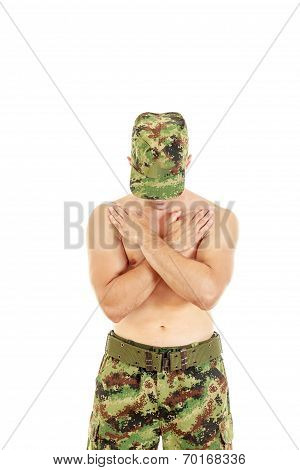 Military Combatant Officer Praying With Arms Crossed And Head Bowed