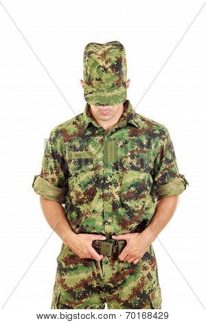 Military Soldier In Camouflage Uniform And Hat Fastened Belt
