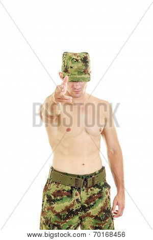 Military Soldier In Camouflage Uniform Pointing At Camera