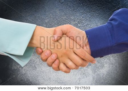 Bild des Firmen-Handshakes auf dem Hintergrund