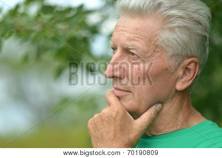 Senior man thinking outddor