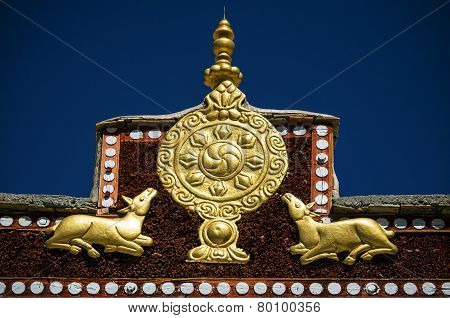 Wheel of Dharma and golden deers