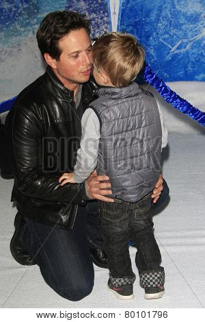 LOS ANGELES - NOV 19: Scott Wolf, son Jackson at the premiere of Walt Disney Animation Studios' 'Frozen' at the El Capitan Theater on November 19, 2013 in Los Angeles, CA