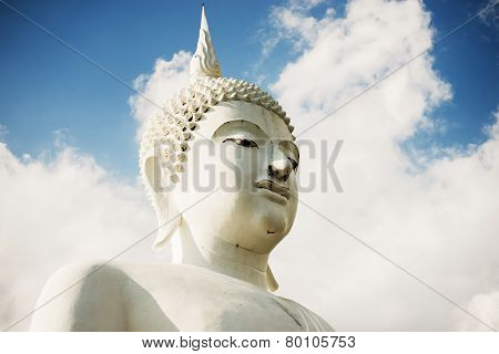 white buddha statue in the temple of Thailand