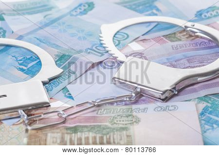 handcuffs and money isolated