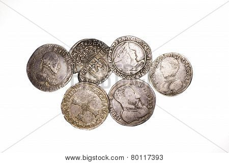 Vintage Silver Coins With Portraits On A White Background