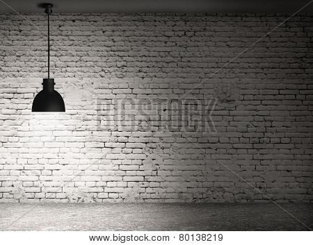 White grunge brick wall and black plafond are lights wall and floor from stone 