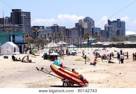 People And Dingy On Addington Beach In Durban