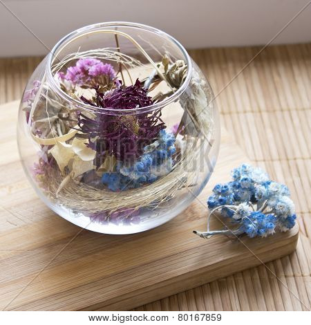 glass vase with dry flowers