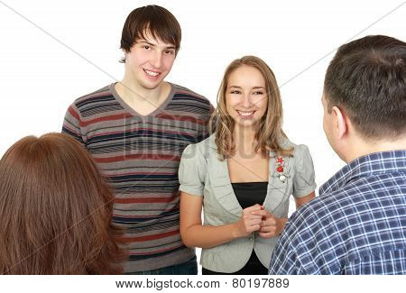 Meeting of young pair with parents.