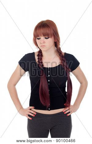 Angry teenage girl dressed in black with a piercing isolated on white background