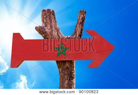 Marocco Flag wooden sign with sky background