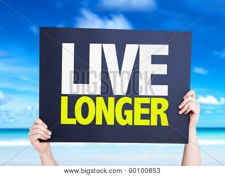 Live Longer card with beach background
