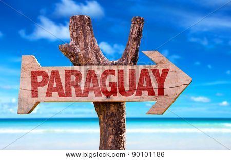 Paraguay wooden sign with lake background