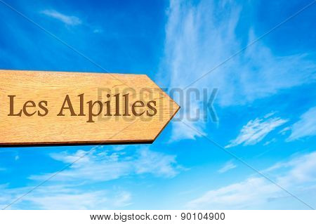 Wooden arrow sign pointing touristic destination
