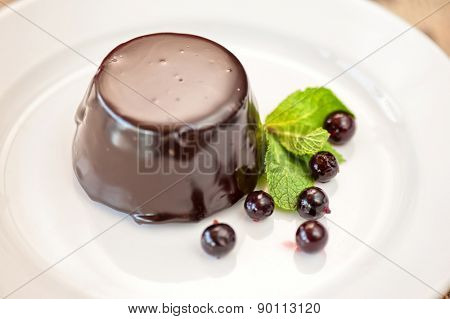 chocolate mousse dessert with currant berries
