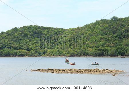 Fishing boat in the sea and the beautiful sky