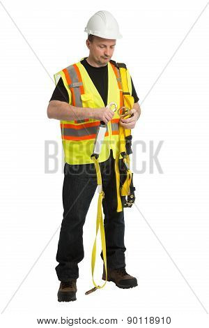 The man in a worker uniform and with building tools