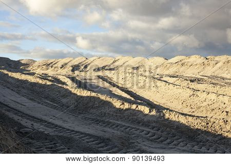 Piles Of Sand With Caterpillar Traces