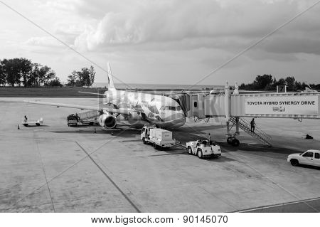 PHUKET - OCTOBER 25, 2011: Bangkok Air jet airplane docked in Phuket International Airport, Thailand. Bangkok Airways Public Company Limited is a regional airline based in Vibhavadi Rangsit Road