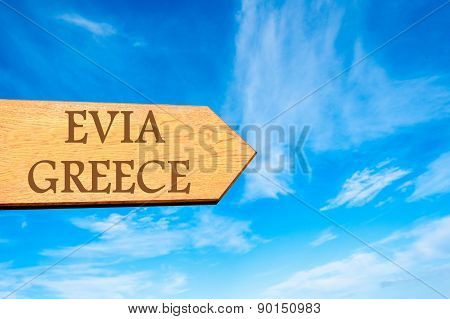 Wooden arrow sign pointing touristic destination