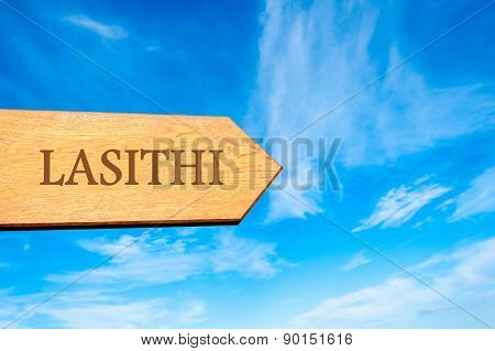 Wooden arrow sign pointing touristic destination