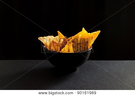 Fried Spicy Lavash Chips In Black Tureen
