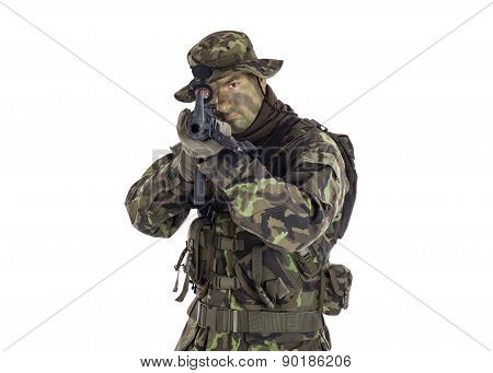 Soldier In Camouflage And Modern Weapon M4.