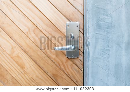 Closeup Brown Wooden Door With Handle Background