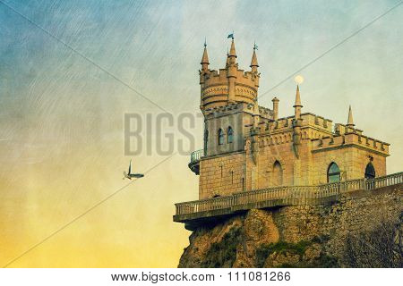 Swallow's Nest, moon and bird, in colorful postcard style