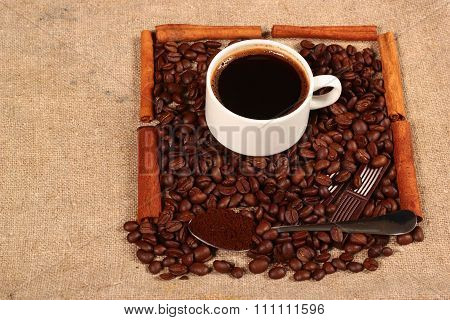 Coffee Beans Cup Of Fragrant Drink And Cinnamon Bars