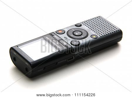 small cassette recorder used to record speech for transcription at a later time