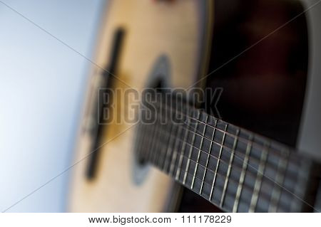 guitar strings and soundboard