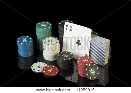 Colorful poker chips with cards