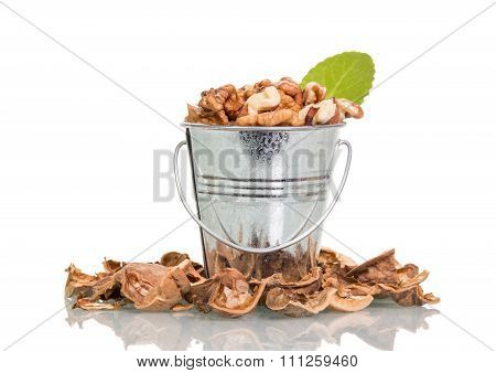 Nuts in metal bucket