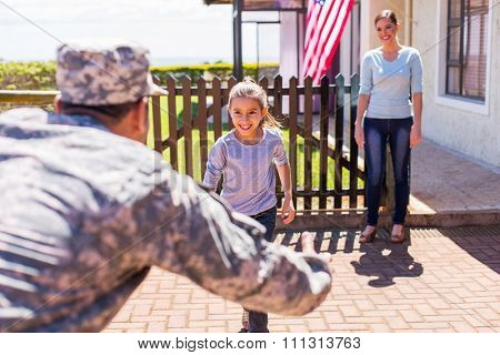 happy young american military family reunion 