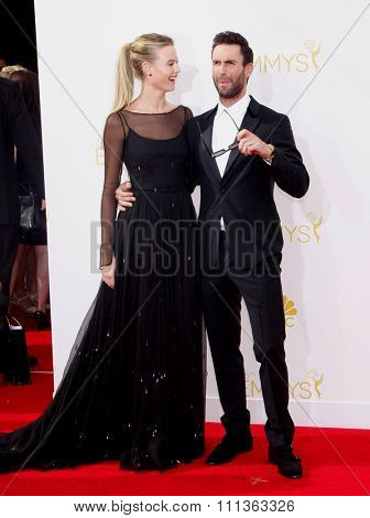 Behati Prinsloo and Adam Levine at the 66th Annual Primetime Emmy Awards held at the Nokia Theatre L.A. Live in Los Angeles on August 25, 2014. 